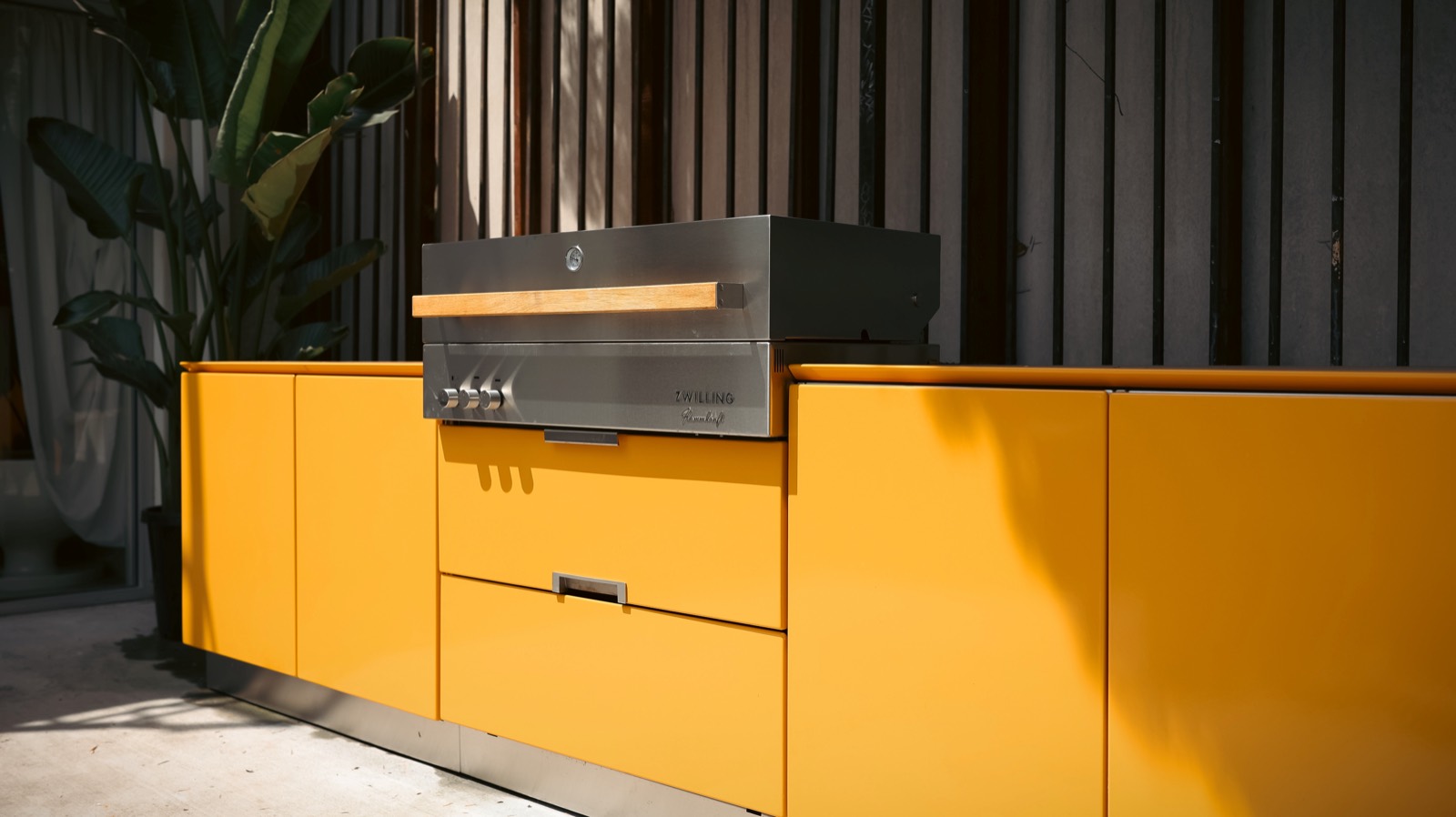 Vlaze kitchen with saffron porcelain enamel fronts
